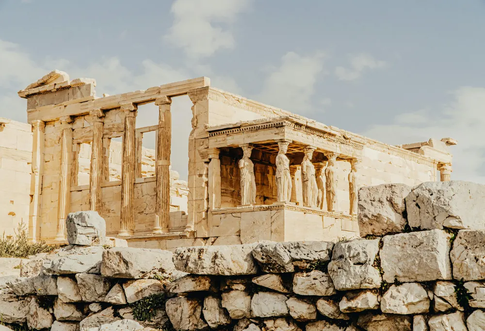 Ancient Greek temple ruins under soft daylight