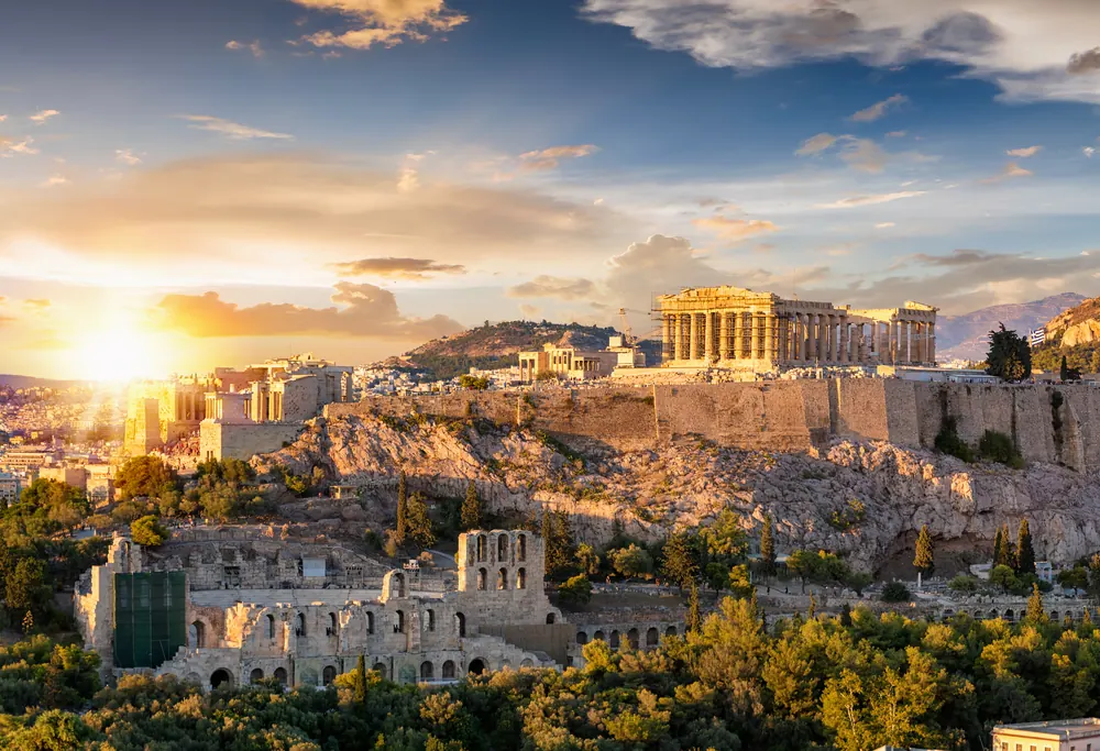 Athens Acropolis and city landscape at golden sunset